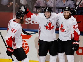 Matt Duchene #9 of Team Canada celebrates his first period goal with Ryan O'Reilly #90 and Joe Thornton #97 while playing Team USA during the World Cup of Hockey at the Air Canada Center on September 20, 2016 in Toronto.