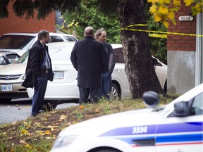 A man was fatally stabbed on Clyde Ave and Ottawa Police major crime unit were on the scene Saturday talking to an unidentified man outside 1098 Clyde Ave.   Ashley Fraser / Postmedia