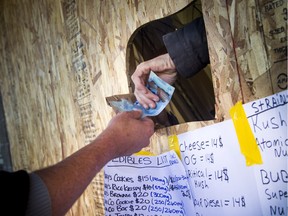 A truck drove into the front entrance of the CannaGreen dispensary in a strip mall on Roydon Place, demolishing the storefront, but that didn't stop them from opening up for business Saturday, Oct. 15, 2016.