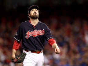 Andrew Miller #24 of the Cleveland Indians reacts against the Toronto Blue Jays in the eighth inning during game one of the American League Championship Series at Progressive Field on October 14, 2016 in Cleveland, Ohio.