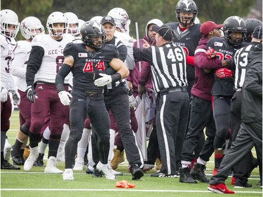 A shoving match breaks out before the game between the Carleton Ravens and University of Ottawa Gee-Gees at MNP Park on Saturday, Oct. 29, 2016.