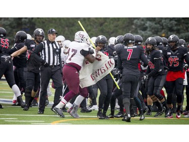 A shoving match breaks out before the game between the Carleton Ravens and University of Ottawa Gee-Gees at MNP Park on Saturday, Oct. 29, 2016.