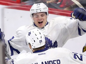 Auston Matthews celebrates his second goal with William Nylander.