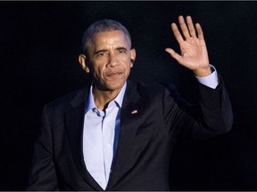 President Barack Obama waves,