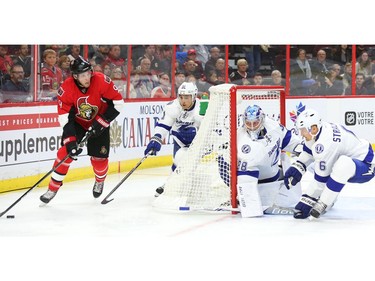 Bobby Ryan of the Ottawa Senators is defended by Valtteri Filppula, goalie Andrei Vasilevskiy and Anton Stralman (6) of the Tampa Bay Lightning.