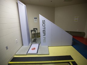 Inmates are required to pass through a $750,000 body scanner that checks for weapons or contraband.