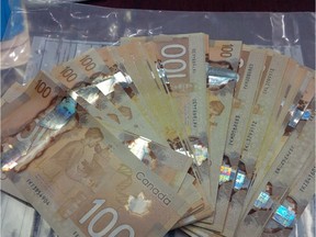 The Canadian Border Services Agency arrested four foreign nationals and seized approximately $70,000 in cash (pictured here) in September.