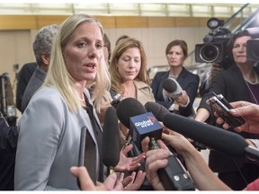 Federal Environment Minister Catherine McKenna speaks to the media after meeting with her provincial counterparts Monday, October 3, 2016 in Montreal.