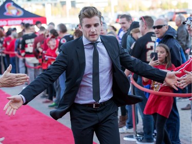 Chris Wideman is greeted by the fans on the red carpet as the Ottawa Senators get set to take on the Toronto Maple Leafs in NHL action at the Canadian Tire Centre.