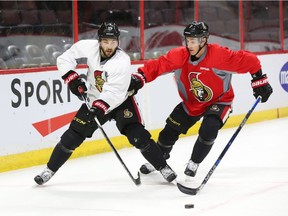 Derick Brassard (L) battles against Kyle Turris of the Ottawa Senators during morning practice at Canadian Tire Centre in Ottawa, October 11, 2016.    Photo by Jean Levac  ORG XMIT: 124984
