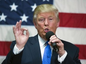 In this Oct. 6, 2016, photo, Republican presidential candidate Donald Trump speaks during a town hall in Sandown, N.H. Trump made a series of lewd and sexually charged comments about women as he waited to make a cameo appearance on a soap opera in 2005. The Republican presidential nominee issued a rare apology Friday, "if anyone was offended."