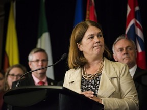 Federal Health Minister Jane Philpott, centre, speaks during a federal, provincial and territorial health ministers' meeting in Toronto on Tuesday, October 18, 2016.