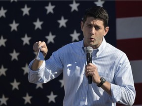 This file photo taken on October 8, 2016 shows House Speaker Paul Ryan speaking during the 1st Congressional District Republican Party of Wisconsin Fall Fest at the Walworth County Fairgrounds in Elkhorn, Wisconsin. US House Speaker Paul Ryan, the nation's top elected Republican, told lawmakers on a conference call October 10, 2016 he will no longer "defend" or campaign with Donald Trump, keeping his distance from his party's beleaguered presidential nominee. "He said he will not defend Trump or campaign with him for the next 30 days," a person on the call said. A Ryan spokeswoman, AshLee Strong, said however that the speaker was not rescinding his endorsement of the provocative billionaire but would "spend the next month focused entirely on protecting our congressional majorities."