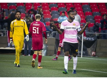 Fort Lauderdale's Gale Agbossoumonde reacts after the Ottawa Fury missed a chance.