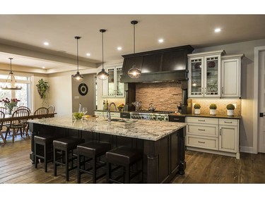 Cardel Homes and Deslaurier Custom Cabinets won the 2016 Housing Design Awards in the category of custom kitchen, 241 sq. ft. or more, traditional, $75,000 and under, for a rustic home in Stittsville.