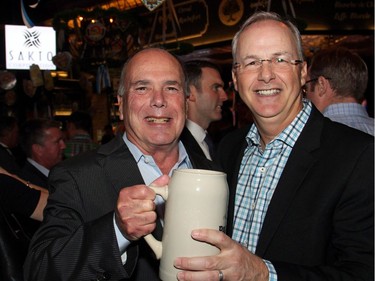 From left, Jacques Emond, co-founding partner of Emond Harnden LLP, with law partner André Champagne at the Capital Oktoberfest benefit for the University of Ottawa Heart Institute, held at the Bier Markt restaurant on Wednesday, October 5, 2016.