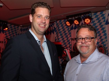 From left, lawyer Hugues Boisvert, founder and CEO of HazloLaw, with chartered accountant Rolland Vaive, a partner at Vaive and Associates, at the second annual Capital Oktoberfest benefit for the University of Ottawa Heart Institute, held at the Bier Markt restaurant on Sparks Street on Wednesday, October 5, 2016.