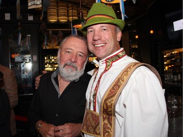 From left, musician and songwriter Dick Cooper from The Cooper Brothers, with Steve Gallant, co-chair of Capital Oktoberfest, at the second annual benefit for the University of Ottawa Heart Institute held at the Bier Markt on Wednesday, October 5, 2016.