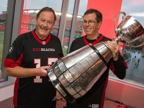 Jim Durrell (L) introduced by Roger Greenberg as the Grey Cup Festival Chair in 2017 in a ceremony prior to the Ottawa Redblacks taking on the Hamilton Tiger Cats in CFL action at TD Place in Ottawa.