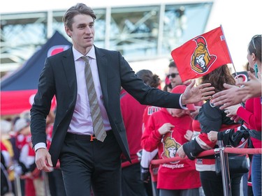Kyle Turris is greeted by the fans on the red carpet as the Ottawa Senators get set to take on the Toronto Maple Leafs in NHL action at the Canadian Tire Centre. Wayne Cuddington/ Postmedia