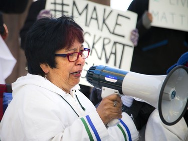 Billy Gauthier's mother, Mitzi Wall, deliveres an emotional speech at the vigil.