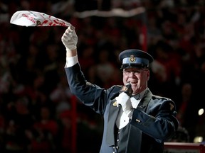 Lyndon Slewidge sings O Canada as the Ottawa Senators take on the Montreal Canadiens at Canadian Tire Centre on April 22, 2015.