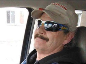 Mitch Paquette, 55, was stabbed to death outside his townhome on Rosenthal Avenue last Thursday.