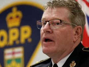 OPP Detective Superintendent Director Dave Truax speaks to the media in Ottawa Ontario Wednesday Oct. 26, 2016. In what's believed to be an unprecedented move, the OPP will text 7,500 cellphones on Thursday that were active in the Hunt Club and Merivale area on the afternoon of Dec. 16, 2015. That's where and when Frederick "John" Hatch, a 65-year-old transient who hitchhiked around Canada, was last seen alive.  Tony Caldwell