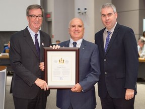 (L to R) Mayor Jim Watson, Giuseppe Nicastro and Coun. Riley Brockinton at city hall on Sept. 28, where Nicastro was presented with a Mayor's City Builder Award.