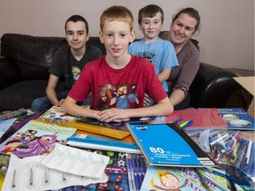 Noah Martincich, 10, with his brother, Curtis Poirier, 14, his cousin, Samuel Blake, 7, and his mom, Renee.