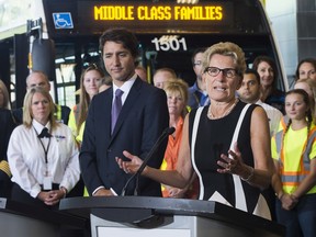 Prime Minister Justin Trudeau is scheduled to make an "important announcement" alongside Ontario Premier Kathleen Wynne, pictured here, and Toronto Mayor John Tory.