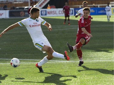 Ottawa Fury FC player Ryan Williams (7) takes a shot against New York Cosmos player Ryan Richter (2) during the NASL match between Fury FC and Cosmos held at TD Place on Sunday, Oct. 9, 2016. (James Park)