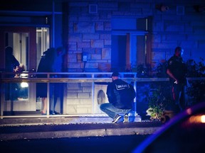 Ottawa police guns and gangs unit, uniform officers and a canine unit were on Ohio Street near the Billings Bridge area of Ottawa after a shooting took place Sunday October 2, 2016.