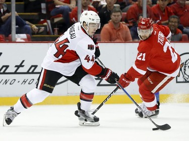 Ottawa Senators center Jean-Gabriel Pageau (44) skates past Detroit Red Wings' Tomas Tatar (21) in the first period.