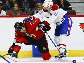 The Ottawa Senators' Zack Smith battles with Montreal Canadiens right-winger Brendan Gallagher at the Canadian Tire Centre on Saturday, Oct. 15, 2016.