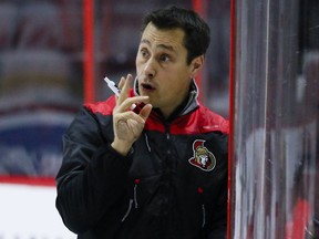 Ottawa Senators head coach Guy Boucher instructs his players during team practice at the Canadian Tire Centre in Ottawa on Friday October 21, 2016.