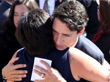 PM Trudeau gets a hug from Laurie Odjick - the mother of missing 16-year-old, Maisy Odjick, who disappeared in 2008. Prime Minister Justin Trudeau, along with a number of his female cabinet ministers, made a surprise visit to a vigil for missing and murdered Indigenous women, girls and Two-Spirit people (MMIWG2S) Tuesday (Oct. 4, 2016) on Parliament Hill.