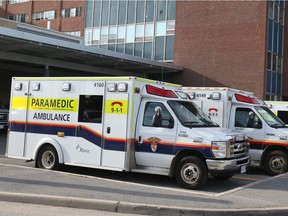 Police cars and ambulance cars at the Ottawa Hospital on Carling Ave, September 30, 2015. (Jean Levac/ Ottawa Citizen)