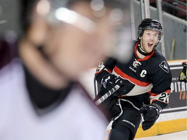 Ravens captain Michael McNamee celebrates his goal in the first period.