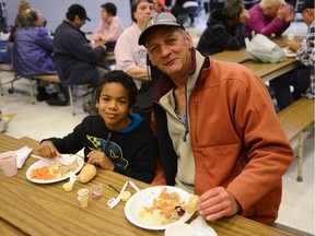 Roger and his son, Tyrell Hooper, were among those enjoying turkey dinner at Sir Guy Carleton Secondary School on Sunday, Oct. 9, 2016.