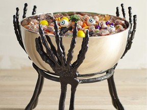 The skeleton hand serving bowl from Pier 1 will add creepy flair to any Halloween event.