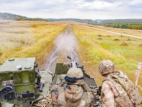A Slovakian soldier shoots an M2 .50 Caliber machine gun mounted on an Outlaw Troop, 4th Squadron, 2nd Cavalry Regiment Stryker, an eight wheeled armored fighting vehicle, during Slovak Shield 2016 live-fire training Oct. 4, 2016 at a multi-purpose range in Military Training Area Lest, Slovak Rep. Understanding weapons of NATO allies is vital to the interoperability of U.S. and allied troops during training or a NATO mission.
(U.S. Army photo by Staff Sgt. Micah VanDyke, 24th Press Camp/Released)
