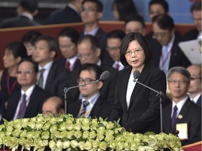Taiwan President Tsai Ing-wen speaks during National Day celebrations in front of the Presidential Palace in Taipei on October 10, 2016.   Taiwanese President Tsai Ing-wen on October 10 called for a resumption of talks with China and pledged that "anything" can be on the table for discussion. Relations with Beijing have deteriorated under Taiwan's first female president, whose China-sceptic Democratic Progressive Party (DPP) took office in May after a landslide victory over the Kuomintang party (KMT).   /