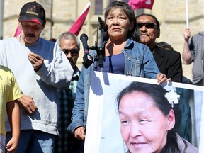 Annie Pootoogook's brother, Pauloosie Joanasie, left, is seen with her cousin, Kilatja Simeonie, at a vigil for missing and murdered indigenous women, girls and Two-Spirit people following Annie's death.