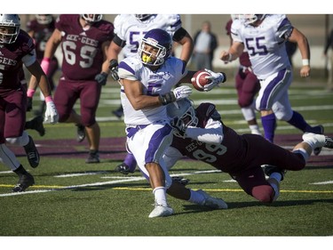 Western's Alex Taylor tries to get away from Kevin Mackey.