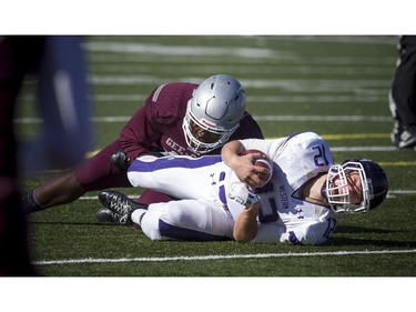The Western Mustangs were in Ottawa to take on the University of Ottawa's Gee-Gees on Saturday, Oct. 15, 2016. The Gee-Gees' Lewis Ward stops Chris Merchant.