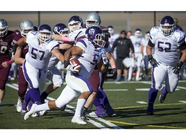 A Western ball carrier gets around the corner.