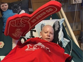 Jonathan Pitre’s mother, Tina Boileau tweeted this photo of Jonathan with  Sens regalia cheering on his favourite team from his hospital bed.