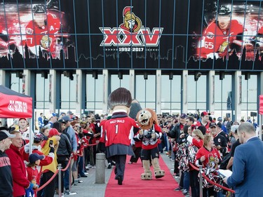 OTTAWA, ON - OCTOBER 12: Fans gather to greet the Ottawa Senators on the red carpet prior to the start of the home opener against the Toronto Maple Leafs at Canadian Tire Centre on October 12, 2016 in Ottawa, Ontario, Canada.