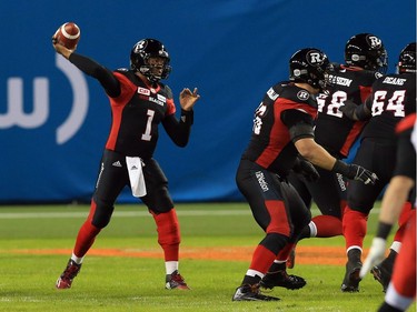 TORONTO, ON - NOVEMBER 27:  Quarterback Henry Burris #1 of the Ottawa Redblacks throws the ball during the first half of the 104th Grey Cup Championship Game against the Calgary Stampeders at BMO Field on November 27, 2016 in Toronto, Canada.